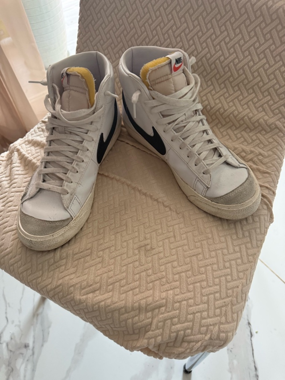Nike White Sneakers with Red Swoosh and Yellow Tongue Detail
